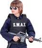 A child wearing a SWAT costume, including a vest and sunglasses, and holding a toy rifle. Produktbild-Vorschau