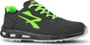 A side view of a black and green safety shoe. Voir les images du produit