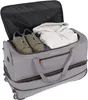 An open travel bag with clothes and shoes inside. Produktbild-Vorschau