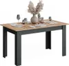 A dining table set for a meal with decorative elements. Produktbild-Vorschau
