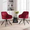 Two red velvet chairs and a small black coffee table in a well-lit room with a large window. Produktbild-Vorschau