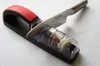 A knife sharpener with a knife being sharpened. Náhled obrázku produktu