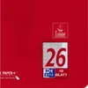 A close-up of a red product with branding and certification labels. Voir les images du produit