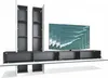 A modern TV stand with cabinets and shelves, with multiple TVs displayed on the stand. Produktbild-Vorschau