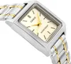 A close-up, angled view of a Casio watch with a silver and gold band and a cream-colored face. Podgląd zdjęcia produktu