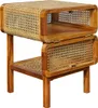 A wooden nightstand with rattan accents. Produktbild-Vorschau