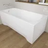 A white bathtub with a skirt and legs is shown in a bathroom setting with wooden flooring and a shelf above. Produktbild-Vorschau