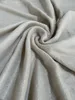 A close-up shot of a gray thermofleece fitted sheet, showing its soft texture and the way it drapes. Produktbild-Vorschau