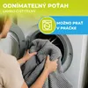 A person is putting a gray blanket into a washing machine. Náhľad obrázku produktu