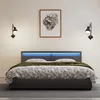 A modern bed with LED lighting in a bedroom setting. Anteprima dell’immagine prodotto