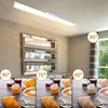 A collage of images showing a modern LED ceiling light and breakfast items. Anteprima dell’immagine prodotto