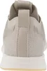 The back view of a beige sneaker. Produktbild-Vorschau