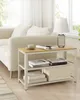 A modern living room scene with a sofa and a side table. Produktbild-Vorschau