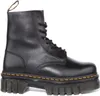 A black leather boot with a thick sole, shown from the side against a white background. Anteprima dell’immagine prodotto