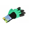 A pair of green and black gardening gloves with black tips on the fingers, shown on a white background with a product tag attached. Anteprima dell’immagine prodotto
