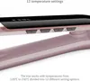 Close-up of a pink hair straightener with a digital display and buttons. Produktbild-Vorschau