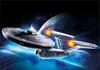A starship in space with planets in the background. Podgląd zdjęcia produktu