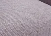 A close-up view of a textured fabric, likely upholstery. Voir les images du produit
