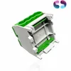 A close-up, angled view of a green and gray electrical connector, isolated on a white background. Produktbild-Vorschau