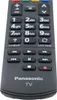 A close-up studio shot of a black Panasonic TV remote control against a light gray background. Produktbild-Vorschau