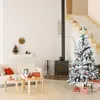 A cozy living room decorated for Christmas, featuring a snow-covered artificial Christmas tree, a fireplace, a sofa, and gifts. Produktbild-Vorschau