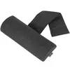 A dark gray bolster pillow with a fabric texture, lying diagonally on a white background. A fabric tag with a logo is visible on the bottom right end of the pillow. Produktbild-Vorschau