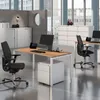 An office environment with desks, chairs, and filing cabinets. Produktbild-Vorschau