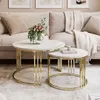 A living room scene with a sofa, coffee tables, and decor. Produktbild-Vorschau