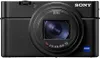 A close-up studio shot of a black Sony compact camera. Podgląd zdjęcia produktu