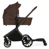 A side view of a brown and black stroller with a buggy board attached. Náhľad obrázku produktu