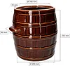 A brown ceramic barrel-shaped pot with measurement indicators. Voir les images du produit