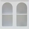 A white sideboard with two arched openings and two shelves in each opening. Anteprima dell’immagine prodotto