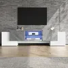 A modern TV stand with a TV mounted above it, set against a brick wall. Anteprima dell’immagine prodotto