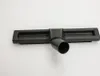 A black vacuum cleaner floor nozzle is shown on a white background. Produktbild-Vorschau