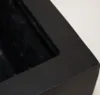 Close-up view of the corner of a black planter. Produktbild-Vorschau