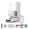 A white robot vacuum cleaner with its docking station, along with several accessories and certification badges, is displayed against a white background. Produktbild-Vorschau