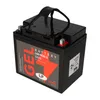 A black gel battery with a red and gray label, shown from a diagonal angle on a white background. Voir les images du produit