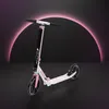 A white and pink scooter is shown against a dark background with a pink neon arch. Náhľad obrázku produktu