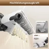 Close-up of a vacuum cleaner head with debris being sucked up, accompanied by comparison graphics. Produktbild-Vorschau