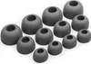 A collection of gray silicone earbud tips of various sizes arranged on a white background. Produktbild-Vorschau