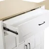 A close-up view of an open drawer on a white kitchen island with a light wood countertop. Produktbild-Vorschau