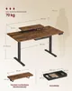 A diagram showing the dimensions and features of a height-adjustable desk, with a silhouette of a person for scale. Produktbild-Vorschau