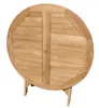A round, foldable teak wood table is shown from above, with its legs folded underneath. Produktbild-Vorschau