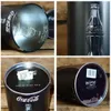 A collage of four images showing a Coca-Cola themed coin bank from different angles. Produktbild-Vorschau