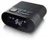 A black digital alarm clock radio with a fabric top and a digital display showing the time and radio information. Náhľad obrázku produktu