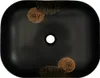 A top-down view of a black ceramic sink with decorative elements. Náhled obrázku produktu