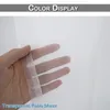 A hand holding a sheer fabric, demonstrating its transparency. Produktbild-Vorschau