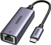 A Ugreen USB-C to Ethernet adapter is shown against a white background. Voir les images du produit