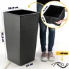 A person is holding a planter insert next to a large planter, with dimensions indicated by text overlays. Produktbild-Vorschau