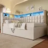 A modern beige upholstered bed with integrated shelving and LED lighting, set in a bedroom. Podgląd zdjęcia produktu